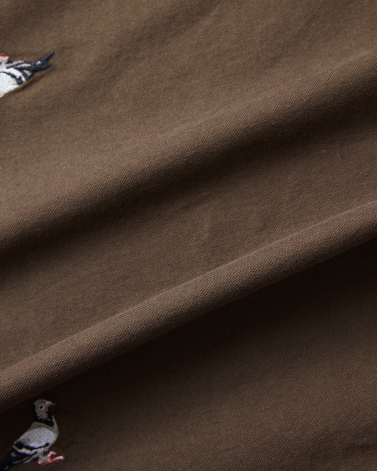 ALL OVER EMB PIGEON SHIRT